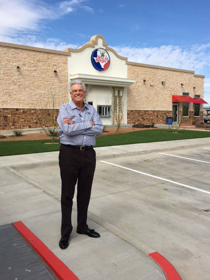 Bobby Cox standing in front of Texas Burger